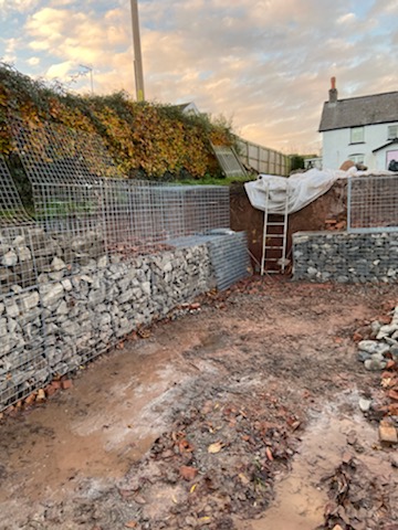 Car parking created using gabion retaining walls